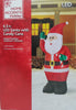 Home Accents Holiday 6.5 ft LED Santa with Candy Cane Airblown Inflatable